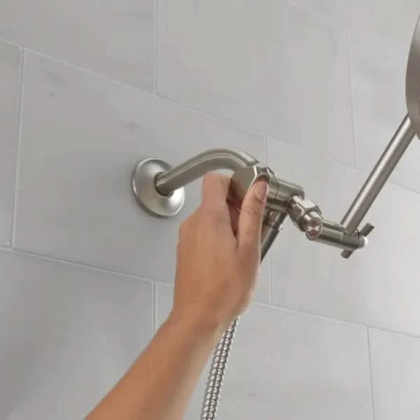 Delta adjustable shower head with hand shower